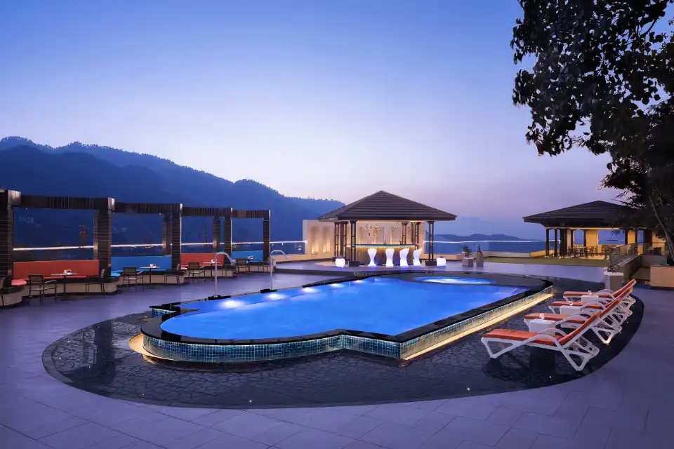 Swimming pool and hill views at dusk, Fortune Resort & Wellness Spa, Bhaktapur